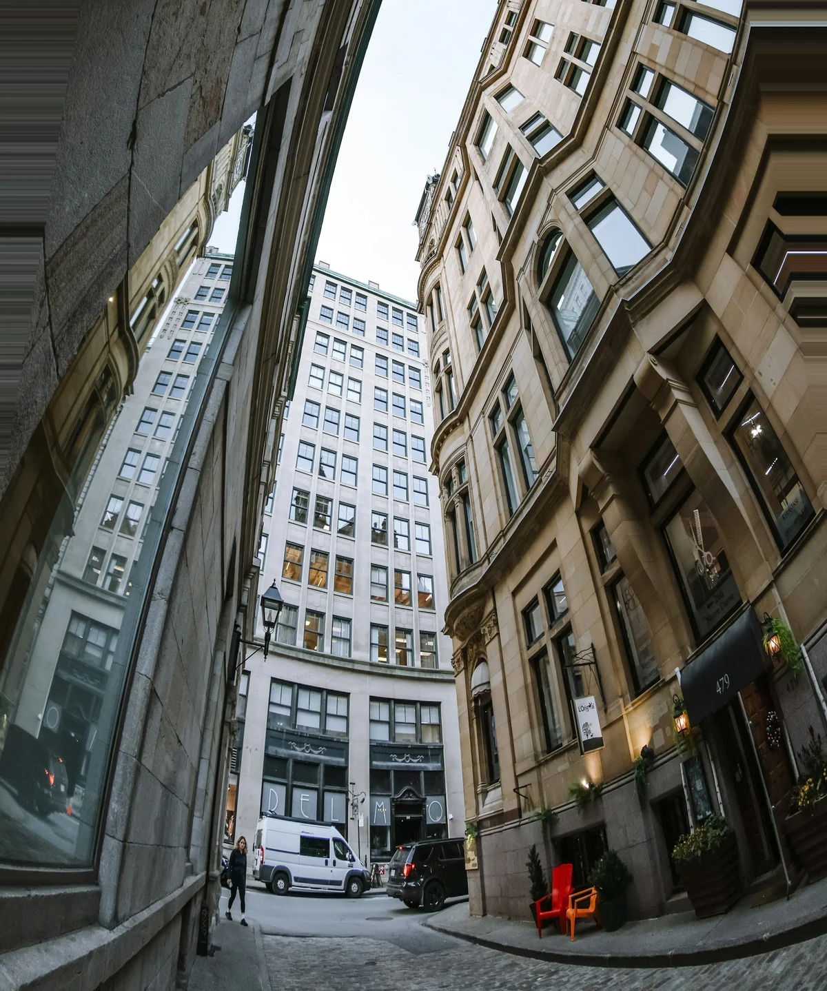 Wide-angle interior with converging walls straightened by AI